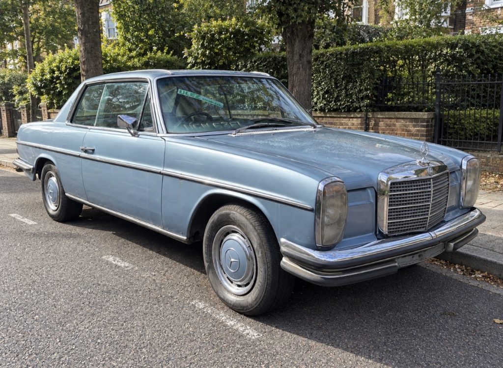 1972 Mercedes-Benz 280 CE pillarless coupé in light blue, front three-quarter view, for sale at Global Classic Car Group, North London