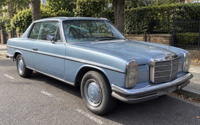 1972 Mercedes-Benz 280 CE pillarless coupé in light blue, front three-quarter view, for sale at Global Classic Car Group, North London
