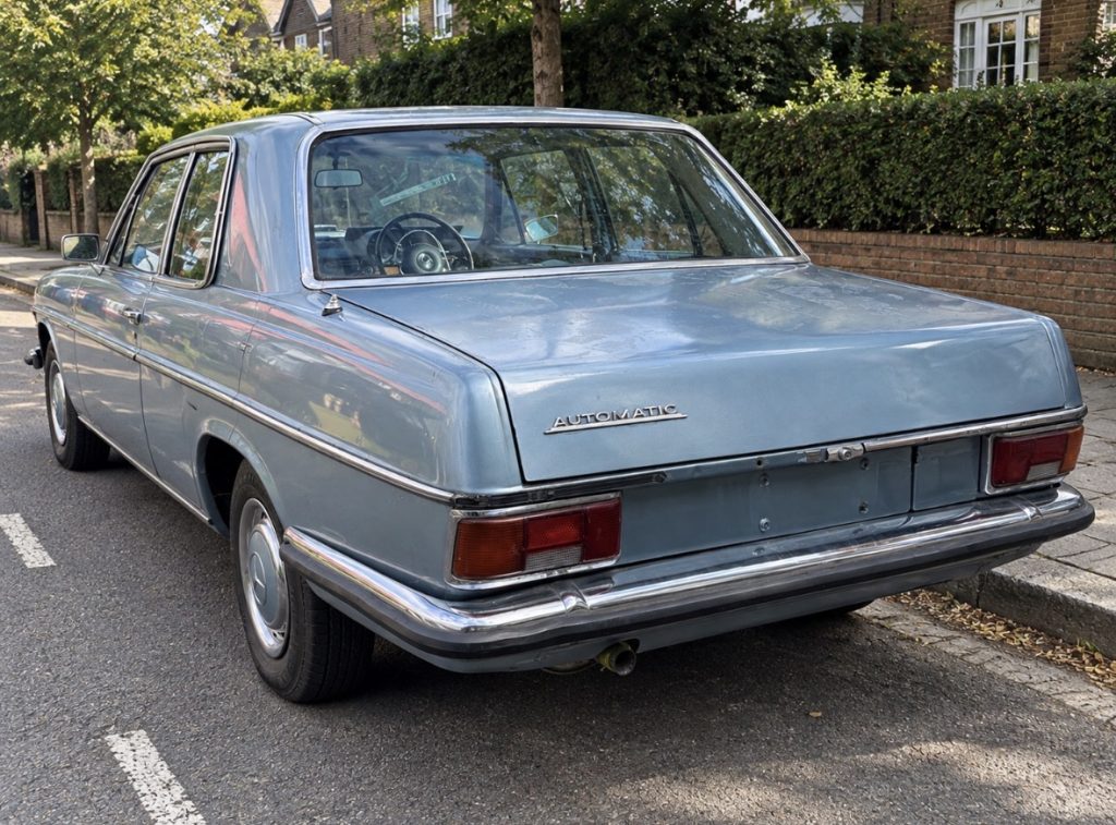 1972 Mercedes-Benz 280 CE pillarless coupé in light blue, rear three-quarter view, for sale at Global Classic Car Group, North London