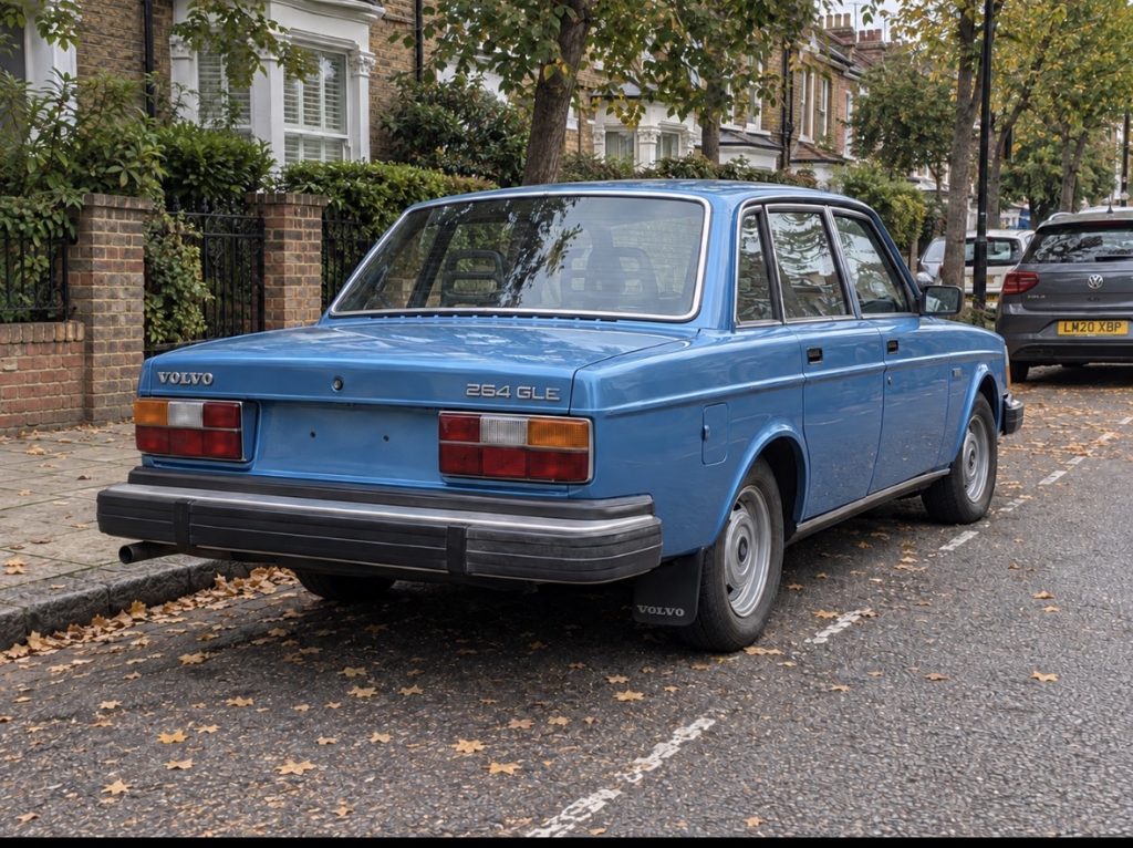 1979 Volvo 264 GLE V6 in blue, rear three-quarter view
